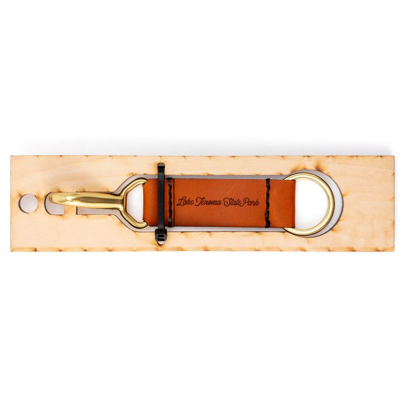 Arrowhead State Park Leather Keychain with Sasquatch design on the other side.