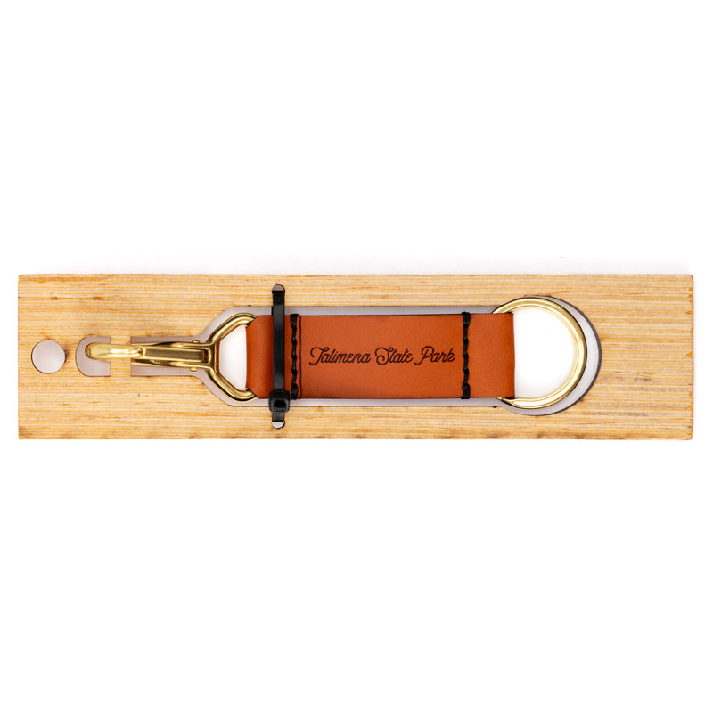 Arrowhead State Park Leather Keychain with Sasquatch design on the other side.