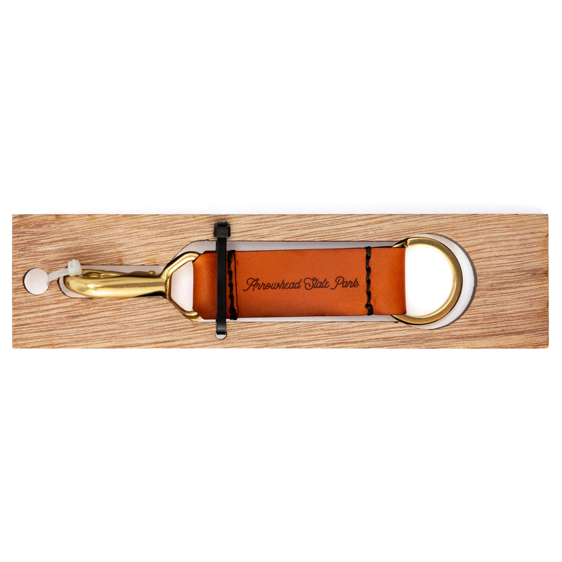 Arrowhead State Park Leather Keychain with Sasquatch design on the other side.