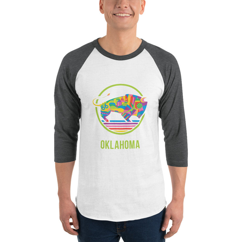 White shirt with black 3/4 sleeve t-shirt with a colorful Travel Oklahoma Bison design.