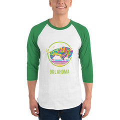 White shirt with black 3/4 sleeve t-shirt with a colorful Travel Oklahoma Bison design.